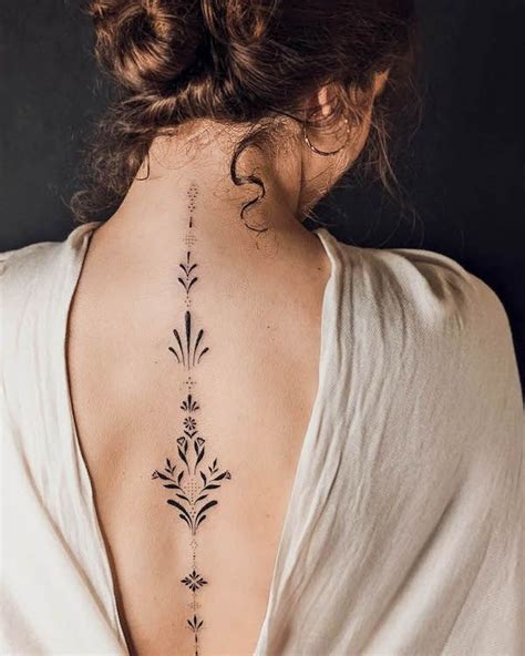 dainty spine tattoos|beautiful spine tattoos for women.